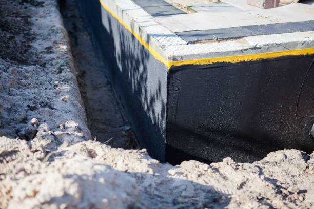 Professional Exterior Waterproofing technician working in Interlaken, NY